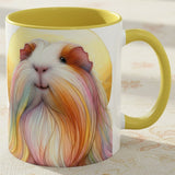 A white ceramic mug with a yellow interior and handle, featuring a colorful illustration of a long-haired guinea pig on the front, set on a light patterned fabric surface. – image 3