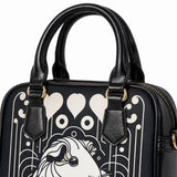 Black shoulder handbag handles, gold-tone hardware, zipper, stitching, and printed material detail – image 6